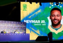 Neymar encara a disputa da Copa do Mundo sob nova regra: jogar se merecer Neymar no telão, o técnico Carlo Ancelotti anuncia a convocação do jogador para a disputa da Copa do Mundo