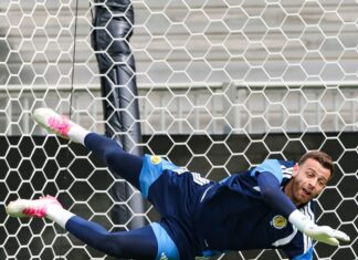 Na última rodada, terminar em terceiro lugar pode classificar ou destruir uma campanha Copa O goleiro escocês Angus Gunn em treino de finalização para encarara o ataque brasileiro no duelo decisivo pelo Grupo C